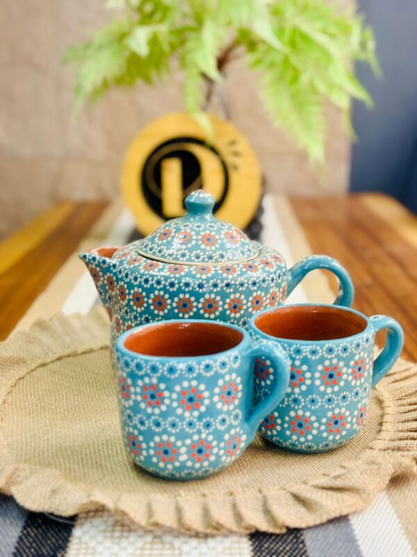 Juego de té en color azul turquesa barro flor de capulín